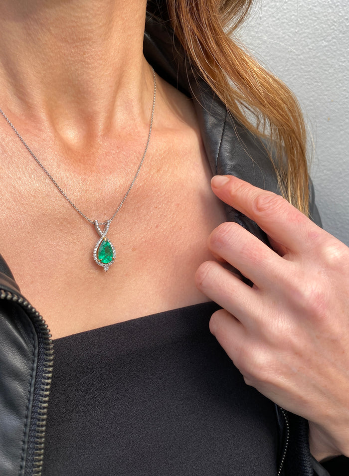 One of a Kind. Emerald diamond halo pendant