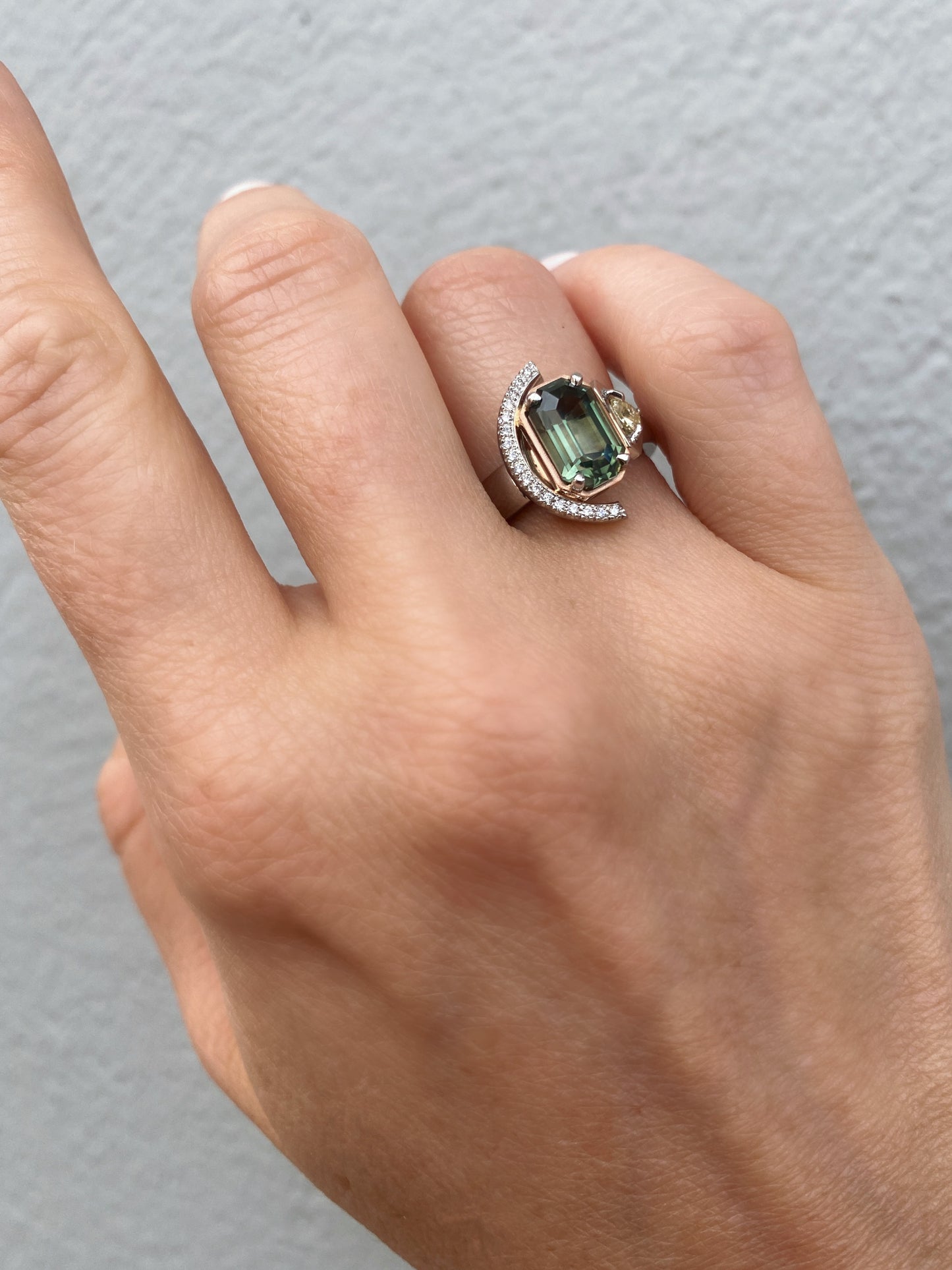 Signature. Crescent Ring with a Green Sapphire