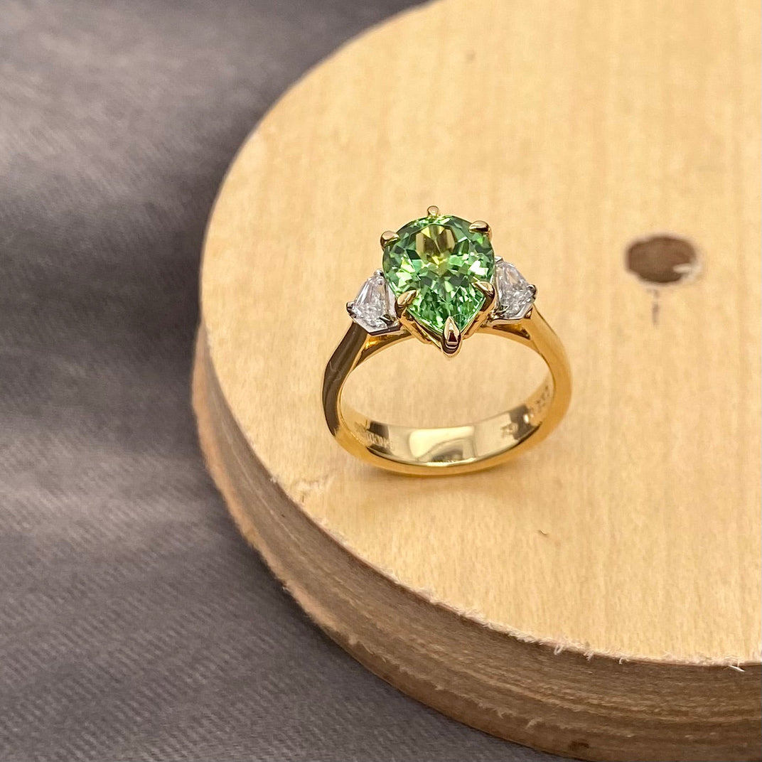 One of a Kind. Trilogy Ring with Green Tourmaline and Diamonds