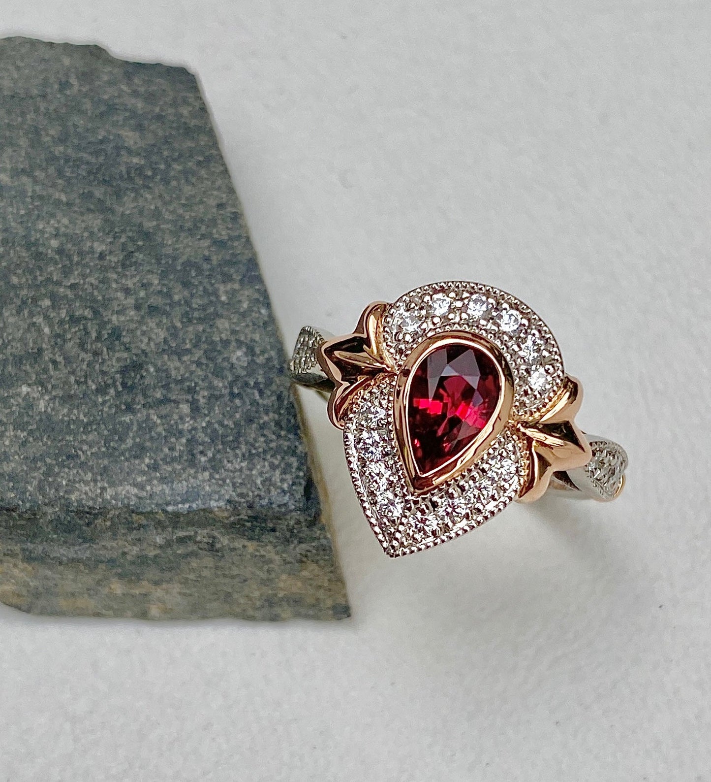 Signature. Deco Halo Ring with Ruby and Diamonds